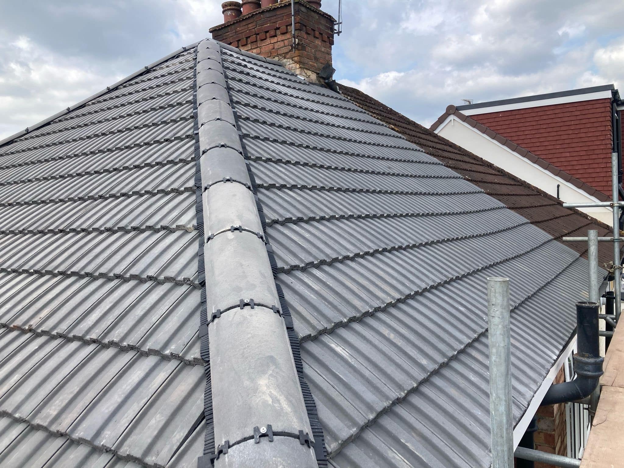 Property Restoration Services roofers completing a re-roof in Chiswick W4