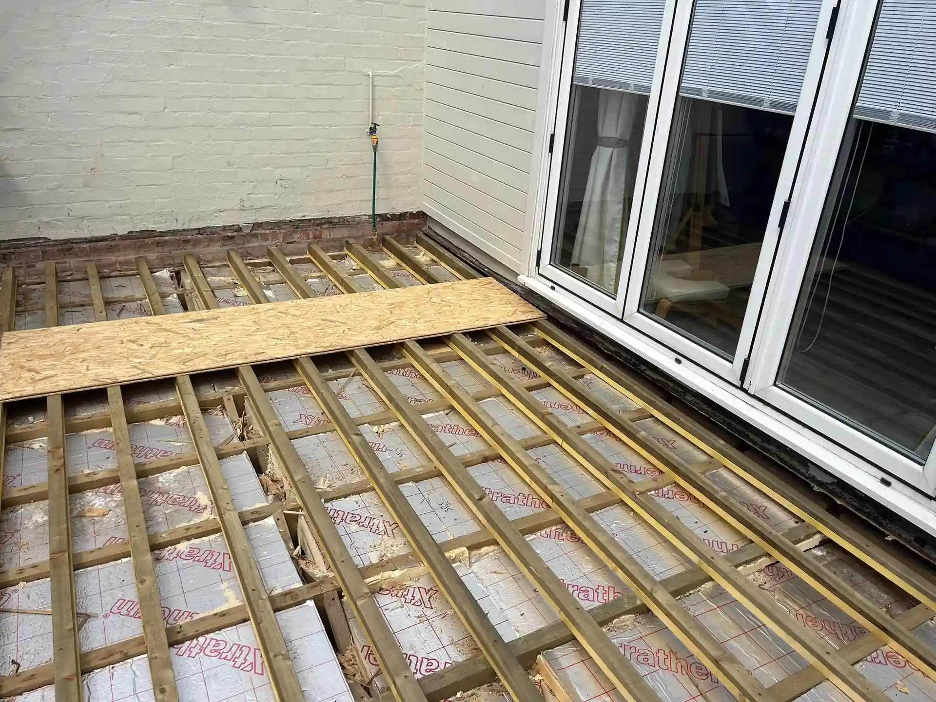 Roofers in Ealing W5 repairing a Victorian villa roof near Walpole Park